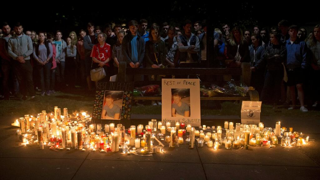 Young mourners, many J1 students, attend a candlelight vigil in Berkeley the night after the Irish students were killed when a balcony in an apartment collapsed during a party. Photograph: Beck Diefenbach/AP Photo