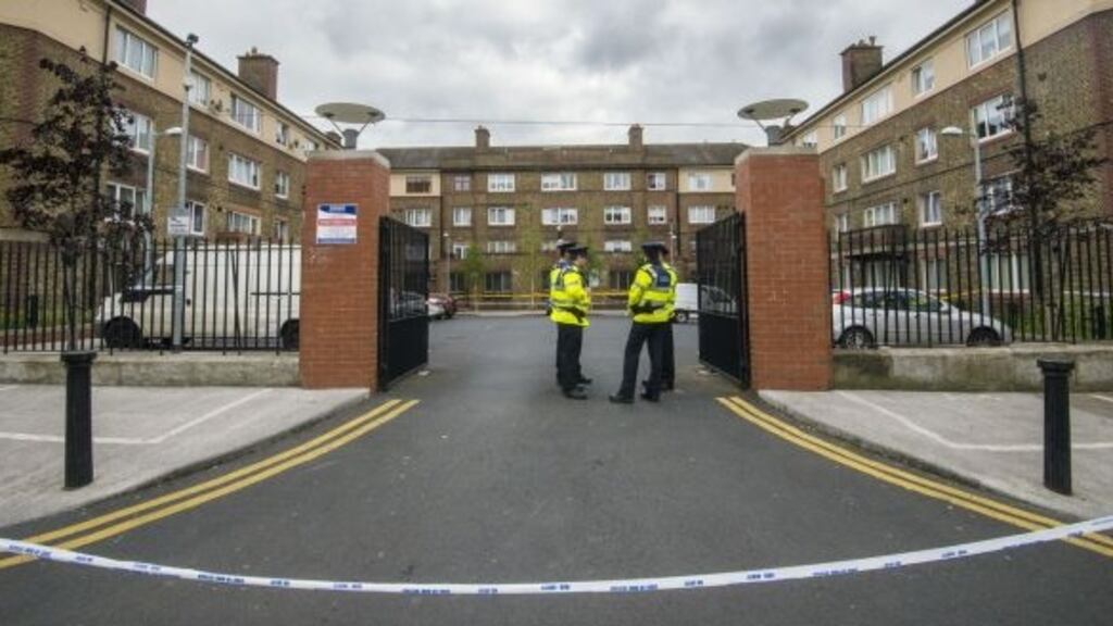 Gardaí outside Avondale House flats on North Cumberland Street, Dublin following the fatal shooting of Gareth Hutch on May 24th, 2016. File photograph: Brenda Fitzsimons/The Irish Times.