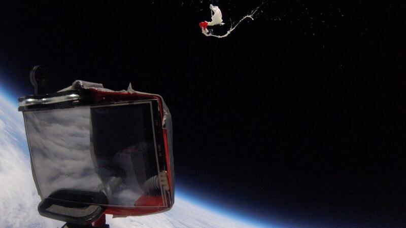 Space Balloon bursts releasing camera capturing images of outer space. Photograph: International Space University
