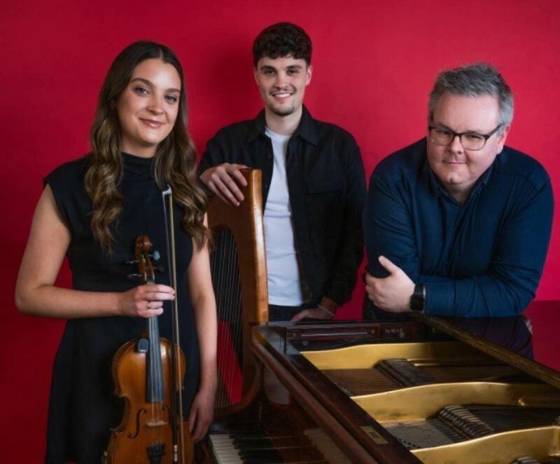 Séamus and Caoimhe Uí Fhlatharta and Ryan Molloy. Photograph: Ruth Medjber