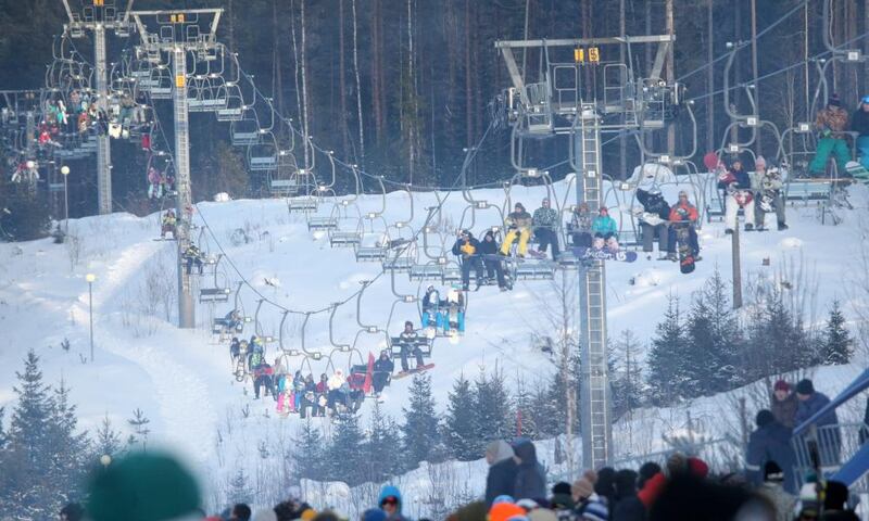 People at the ski resort of Igora, outside St Petersburg. The resort was the venue for the wedding of Putin’s daughter. Photograph: Anatoly Maltsev/EPA