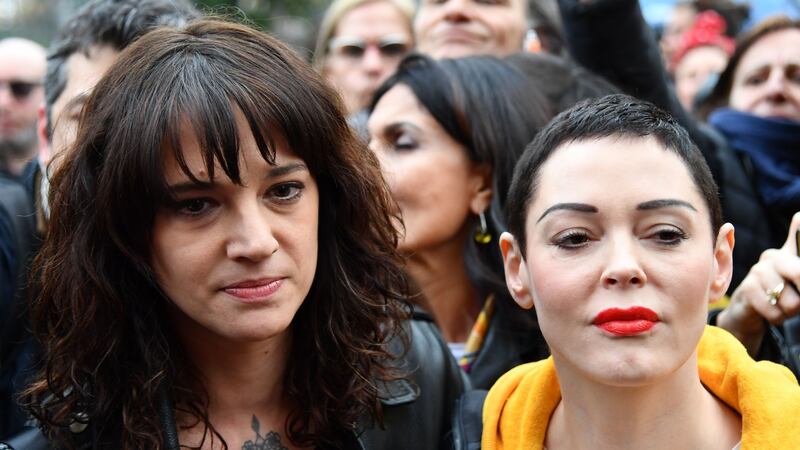 Italian actor Asia Argento and US actor Rose McGowan, who both accused Harvey Weinstein of sexual assault, take part in a march as part of the International Women’s Day in Rome. Photograph: Alberto Pizzoli/AFP/Getty Images)