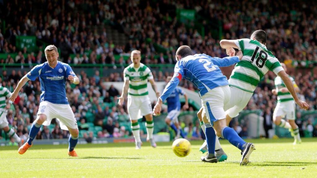 Celtic’s Tom Rogic scores their second goal St Johnstone at Celtic Park. Photograph: Reuters