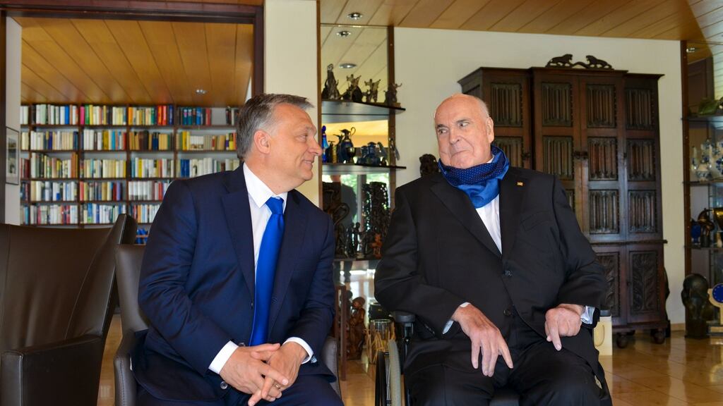 Both Hungarian prime minister Viktor Orban (L) and former German chancellor Helmut Kohl insisted there was no contradiction in their migration suggestions and those of Angela Merkel. Photograph: Daniel Biskup/Reuters