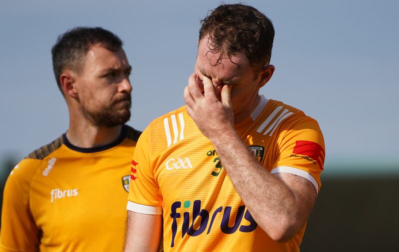 Antrim's Ryan McGarry dejected after losing. Photograph: Leah Scholes/Inpho