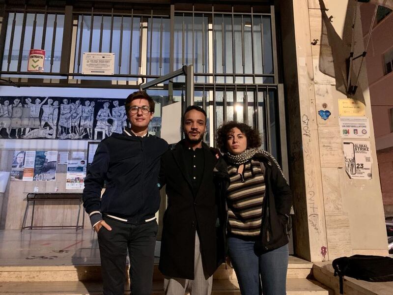 Omar Neffati (centre) with his friends Francesco Boscheri (left) and Lucia Ferrante. Over the years, Neffati has seen Brothers of Italy and its coalition partners vote against measures that would give him rights as a non-citizen.
