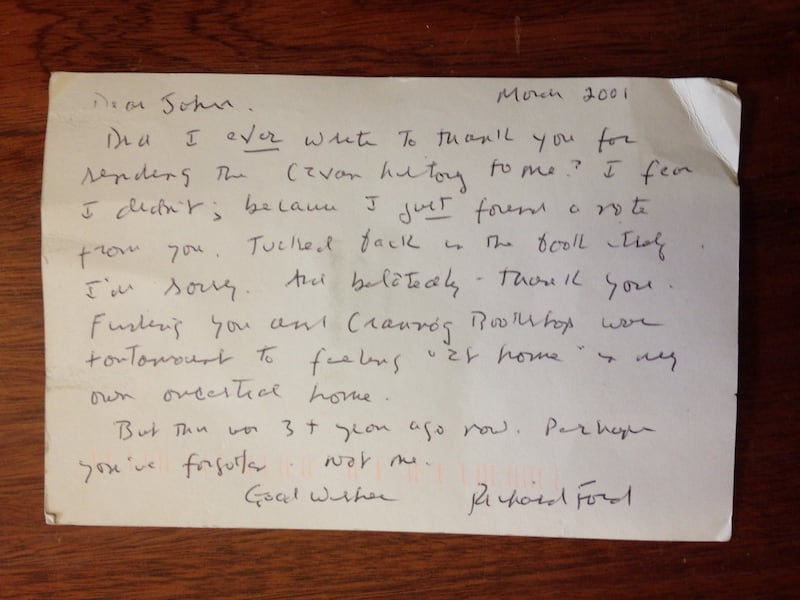 The postcard John McEvoy received from US author Richard Ford, who visited his shop while searching for his ancestors