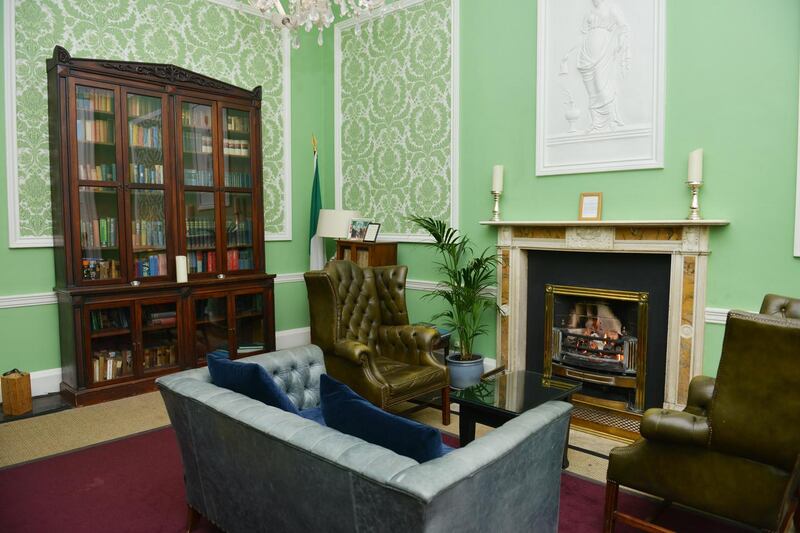 A sitting area with a marble fireplace at the Stephen’s Green Hibernian Club. Photograph: Bryan O’Brien
