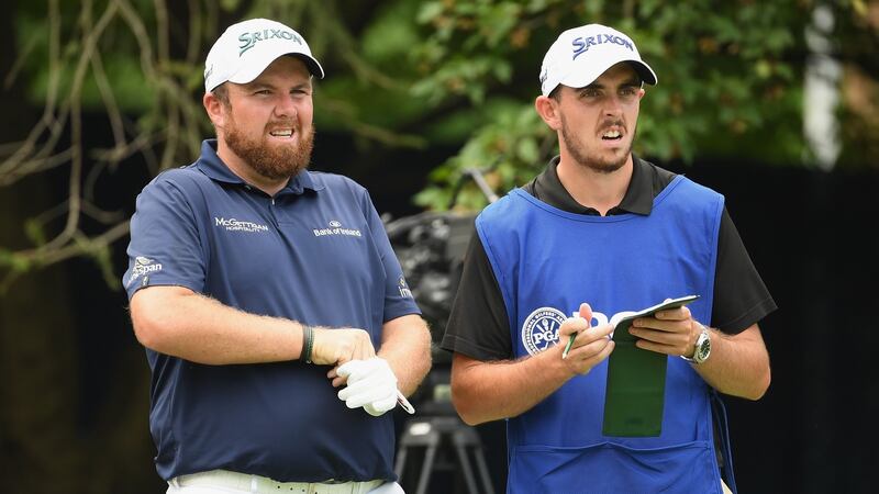 Shane Lowry with his brother Alan on the 18th tee. Photo: Ross Kinnaird/Getty Images