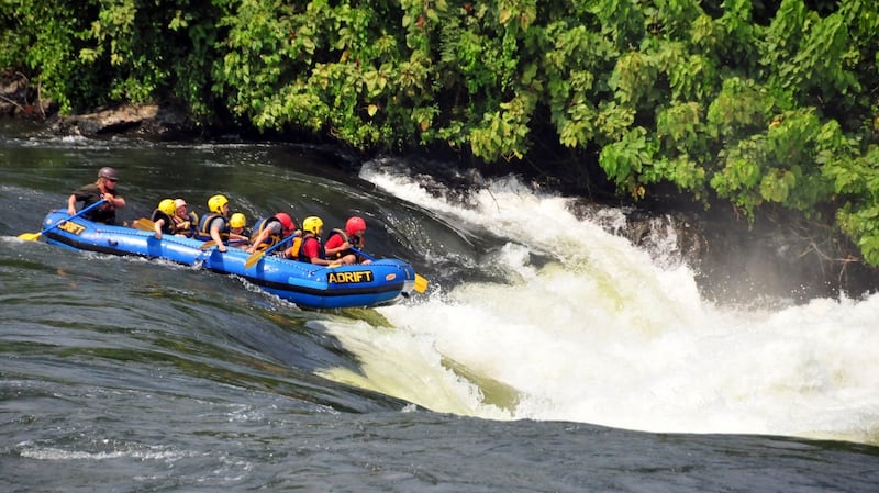 Bujagali Falls, Uganda: a group of whitewater rafters on an inflatable boat going down the rapids. Photograph: Getty Images