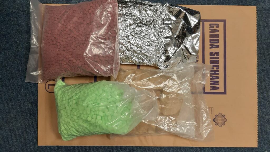 Two large plastic barrels, which contained 76.9kg of suspected ecstasy tablets packed in bags and 8.27kg of suspected MDMA in blocks, were found by gardaí. Photograph: An Garda Síochane/Facebook