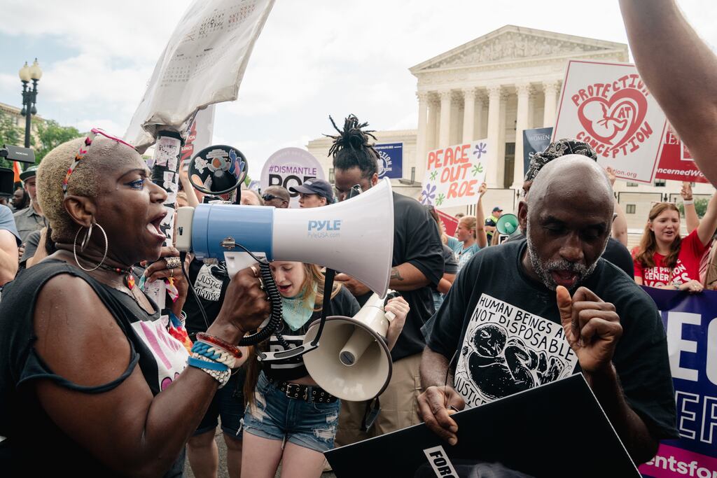 Abortion rights advocates (left) face off against anti-abortion demonstrators outside the Supreme Court in Washington on Friday. Photograph: Shuran Huang/The New York Times