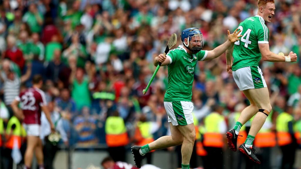 Limerick’s Richie McCarthy and William O’Donoghue celebrate at the final whistle after victory over Galway at Croke Park. Photograph: James Crombie/Inpho