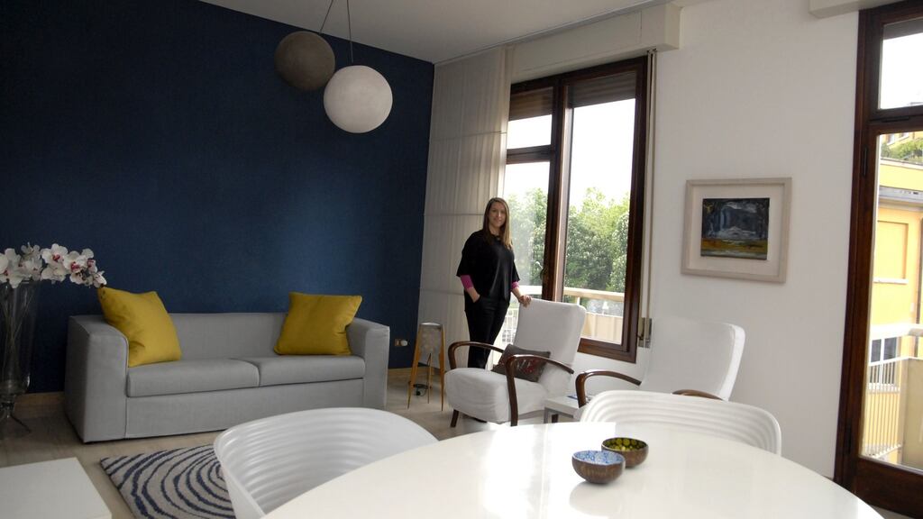 Elizabeth Francis loves the oval shape of her white Kartell table