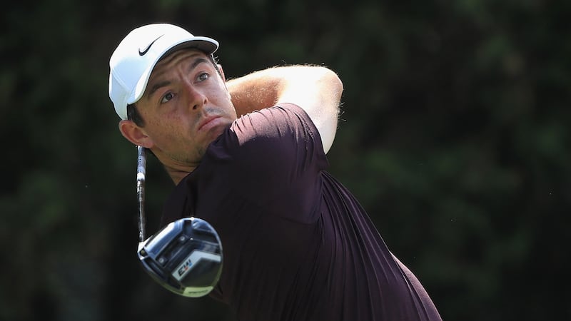 Rory McIlroy plays his shot from the eighth tee during the first round of the Tour Championship at East Lake golf club. Photograph: Sam Greenwood/Getty Images