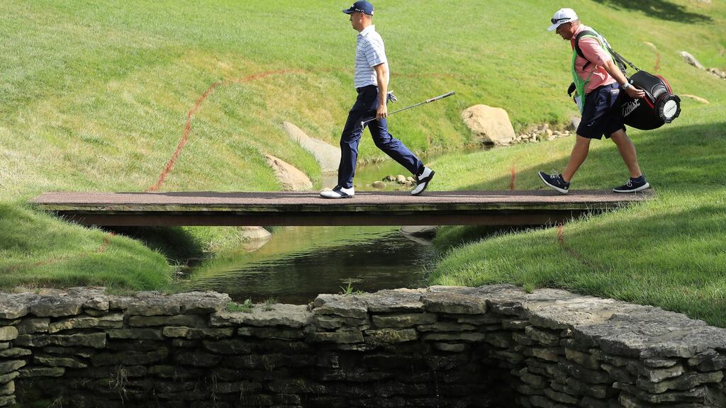Justin Thomas walks with his caddie Jimmy Johnson during the third round of the Workday Charity Open at Muirfield Village Golf Club in Dublin, Ohio. Photo: Sam Greenwood/Getty Images