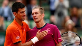 Novak Djokovic breezes into second round after second set wobble