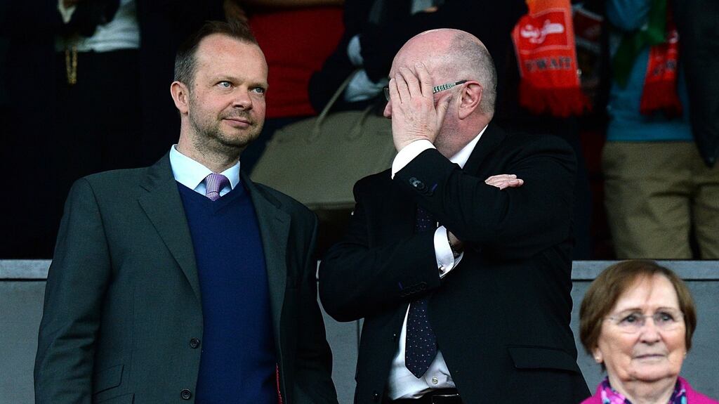 Manchester United’s chief executive Ed Woodward (left) in the stands at Old Trafford, Manchester.