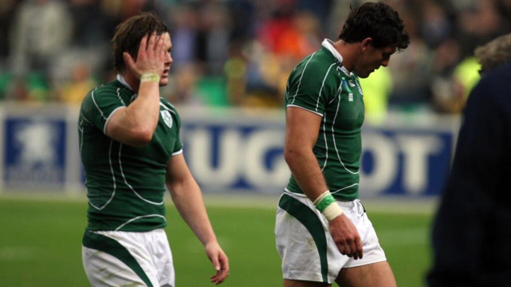 Brian O’Driscoll and Shane Horgan show their disappointment after the defeat by France at the 2007 World Cup. Morgan Treacy/Inpho