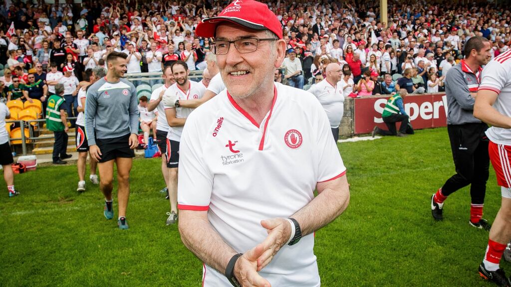 Tyrone manager Mickey Harte celebrates his side’s win over Donegal. Photograph: Ryan Byrne/Inpho