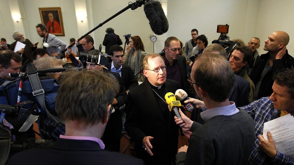 The head of the Catholic Church in the Netherlands, Cardinal Wim Eijk (centre) photographed in 2011. He has criticised Pope Francis for failing to give clear guidance to German cardinals on whether the non-Catholic partners of Catholics should be allowed to share in the Eucharist. Photograph: Bas Czerwinski/AP