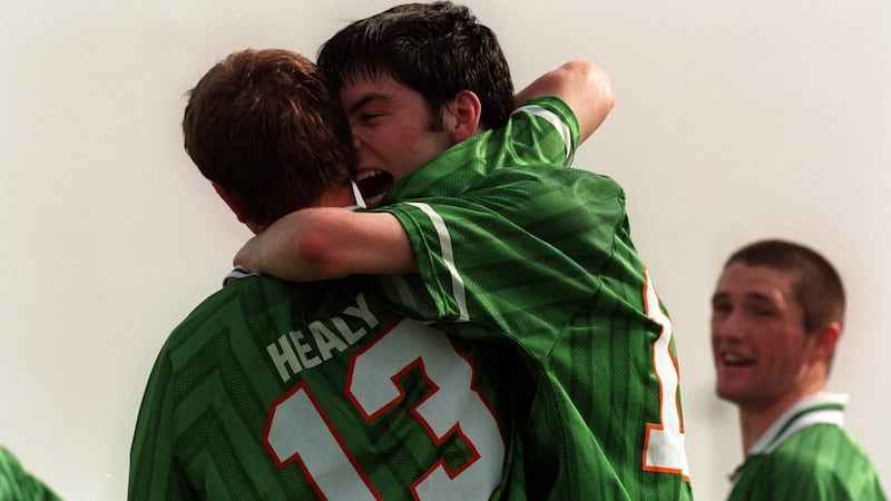 Sadlier is congratulated by Colin Healy after scoring for Ireland during the under-20 World Cup in 1999. Photo: Lorraine O’Sullivan/Inpho