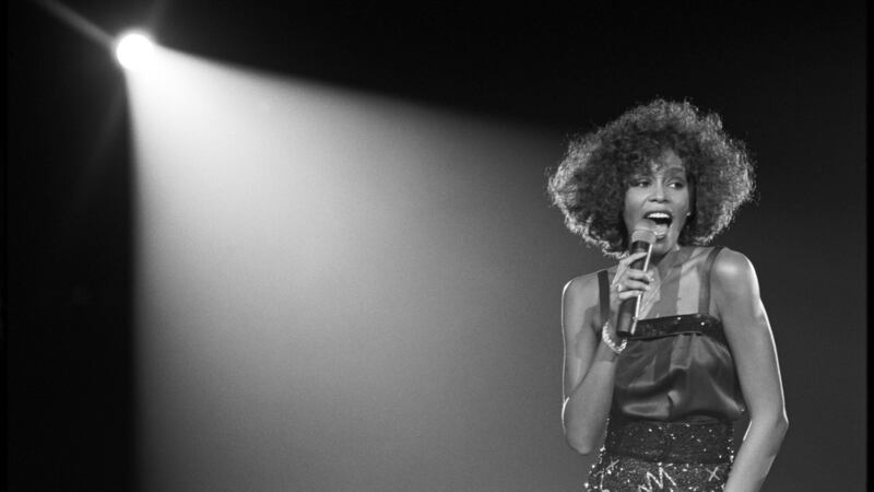 Whitney Houston performs on stage at the Wembley Arena, UK, in May 2005. Photograph: David Corio/Redferns