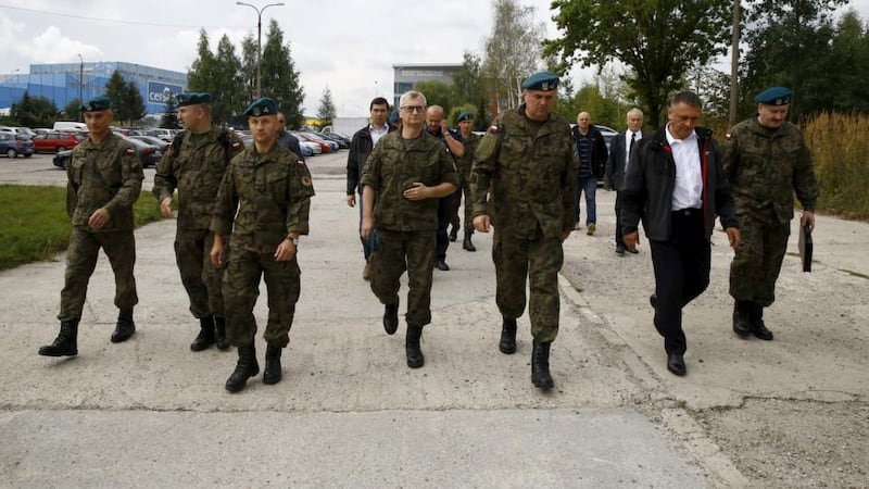 Soldiers and officials arrive to inspect site (65 km of railway between Wroclaw and Walbrzych) in an area where the Nazi train is believed to be. Photograpg: Kacper Pempel/Reuters