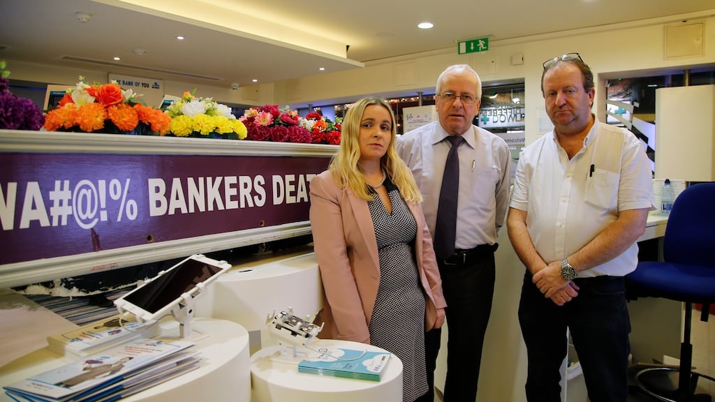 Carol Nolan, Mattie McGrath and Michael Collins at the KBC branch on Baggot Street, Dublin. Photograph: Nick Bradshaw/The Irish Times