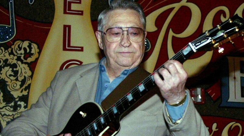 Scotty Moore playing music at the second annual Ponderosa Stomp in New Orleans. Photograph: AP Photo/Judi Bottoni