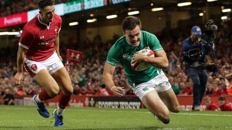 Jacob Stockdale crosses to score for Ireland against Wales. Photograph: Billy Stickland/Inpho