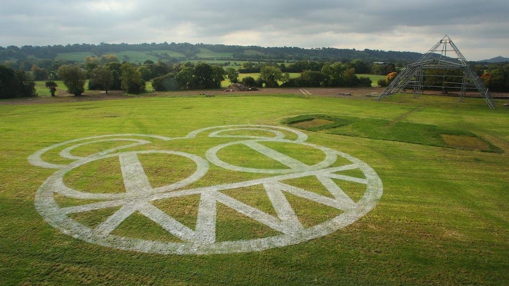 Radiohead’s logo on the grass beside the Pyramid Stage at Glastonbury