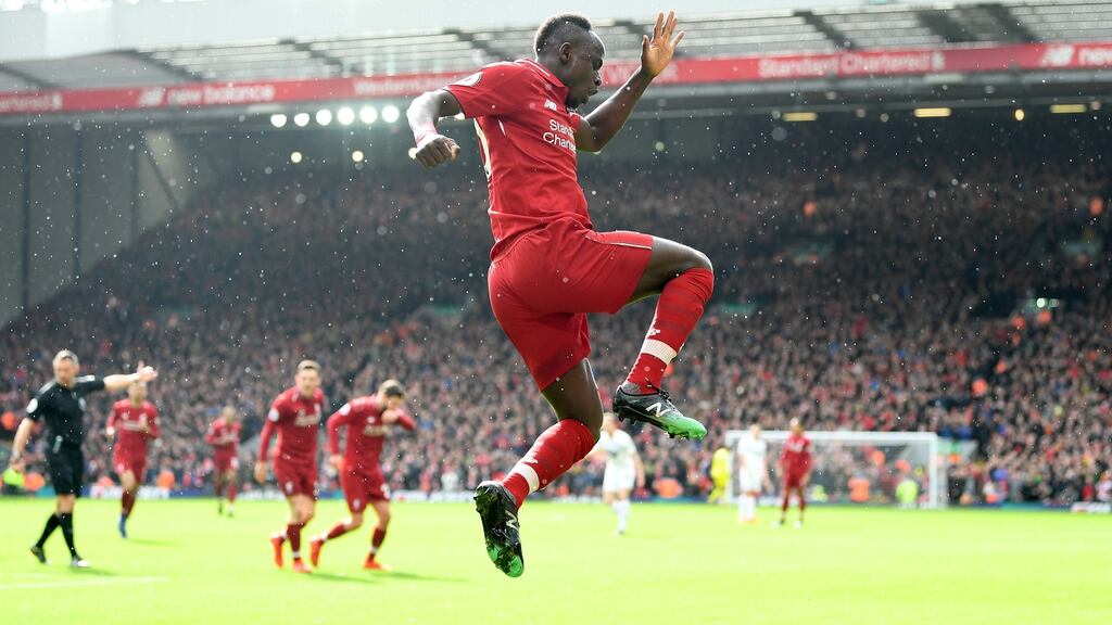 Sadio Mané of Liverpool celebrates scoring his side’s second goal during the Premier League match between Liverpool and Burnley at Anfield. Photo: Michael Regan/Getty Images