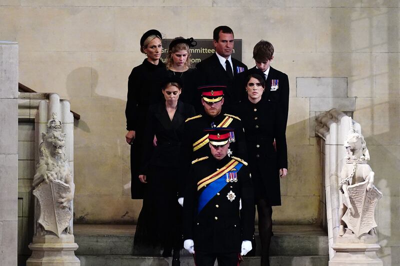 Queen Elizabeth II's grandchildren arrive to hold a vigil around her coffin in Westminster Hall, at the Palace of Westminster in London. Photograph: AARON CHOWN/POOL/AFP via Getty Images