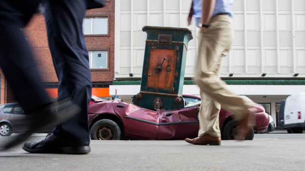 An art installation of a safe dropped on a car on O’Connell St in Limerick forms part of Limerick City of Culture’s calendar this weekend. photograph: alan place/fusionshooters