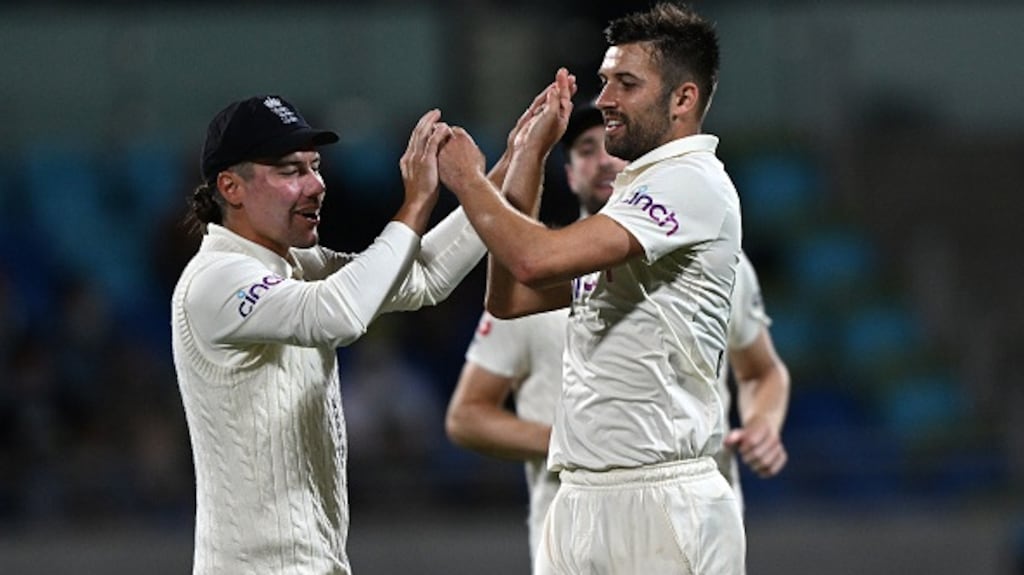 Mark Wood of England celebrates his wicket of Usman Khawaja. Photograph:  Steve Bell/Getty Images