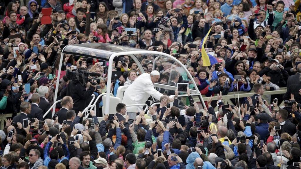 Pope Francis waves at the end of the Easter mass in St Peter’s Square at the Vatican. Photograph: Max Rossi/Reuters.