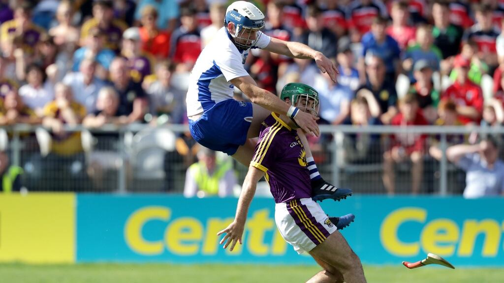 Wexford’s Shaun Murphy with Stephen Bennett of Waterford. Photograph: Morgan Treacy/Inpho