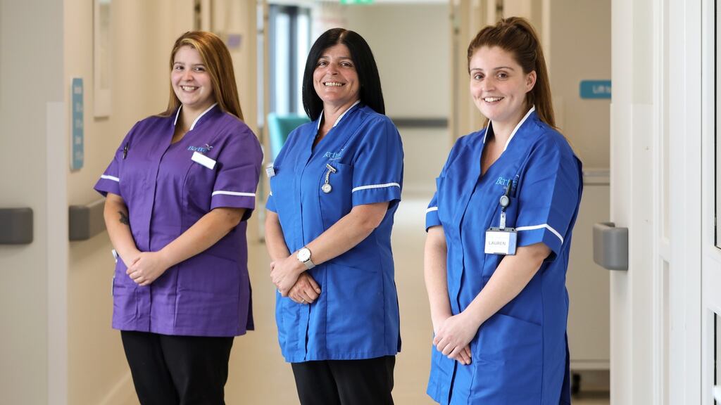 Clare Guinan (centre) and her daughters Megan and Lauren who moved into Bartra Healthcare’s Loughshinny Nursing Home four weeks ago to help protect the residents against Covid-19. Photograph: Crispin Rodwell/The Irish Times