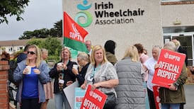 Irish Wheelchair Association members on strike from care centres in pay dispute