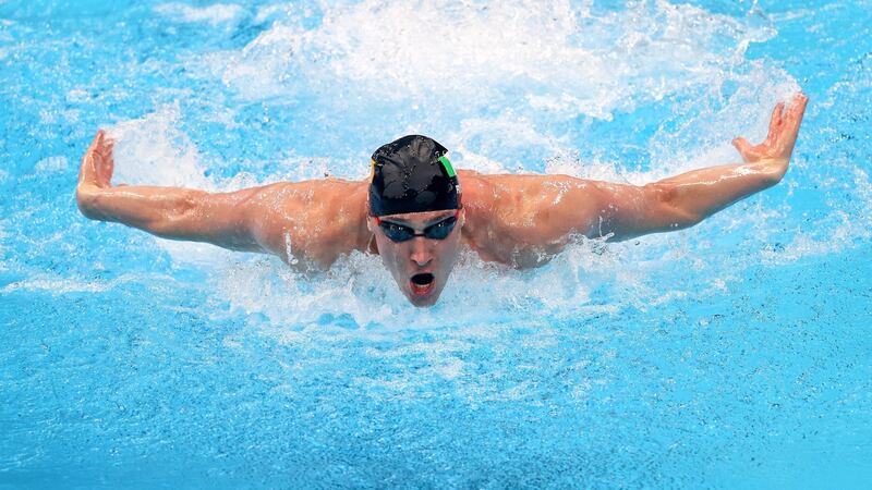 Shane Ryan on the way to finishing fourth in his heat for the 100m butterfly. Photo: Bryan Keane/Inpho
