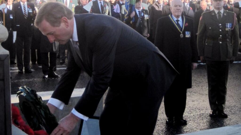 Taoiseach Enda Kenny lays a laurel wreath at the war memorial in Enniskillen, Co Fermanagh. Photograph: David Young/PA Wire