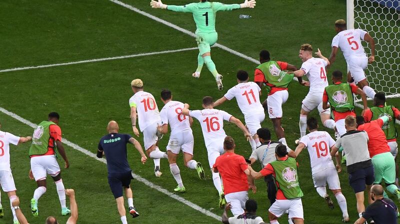 Switzerland celebrate after Yann Sommer’s penalty save saw them beat France in Bucharest. Photograph: Daniel Mihailescu/Getty/AFP