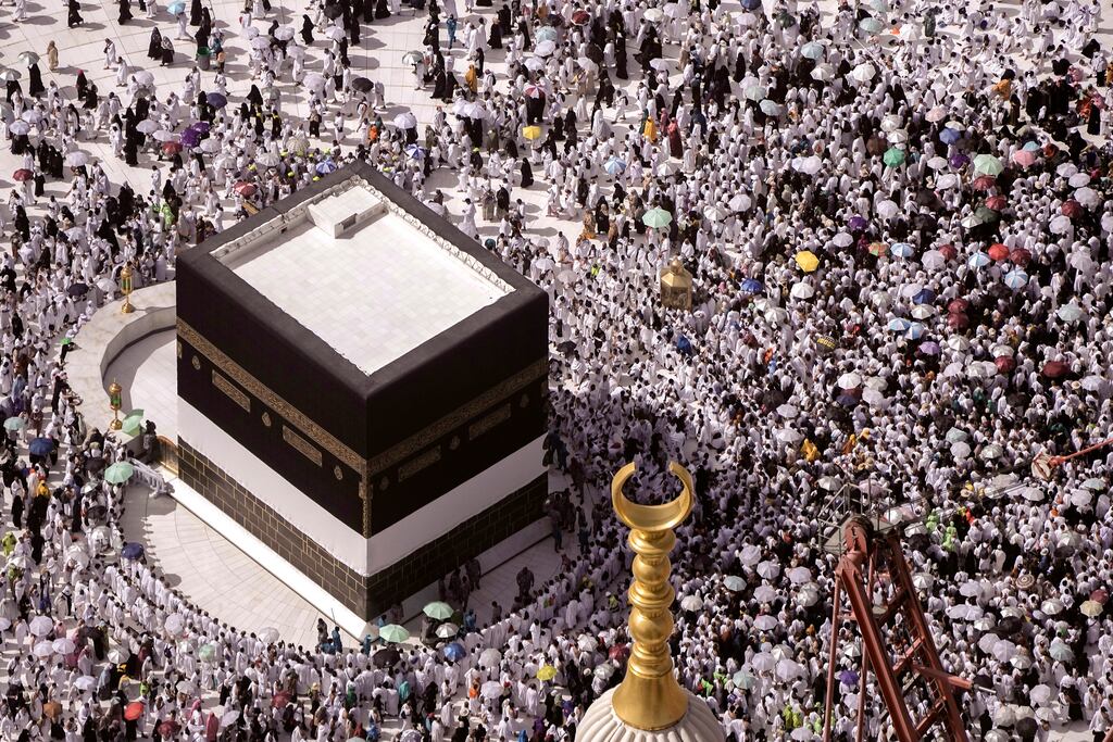 Thousands of Muslim pilgrims walk around the Kaaba, a cubic building at the Grand Mosque, during the annual Hajj pilgrimage. Photograph: AP
