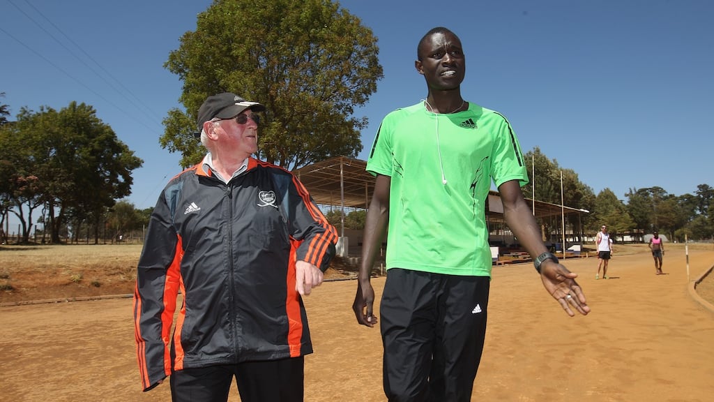 David Rudish  walks with  Brother Colm O’Connell  ahead of a track training session at Moi University   in Eldoret, Kenya in 2012. Photo: Michael Steele/Getty Images