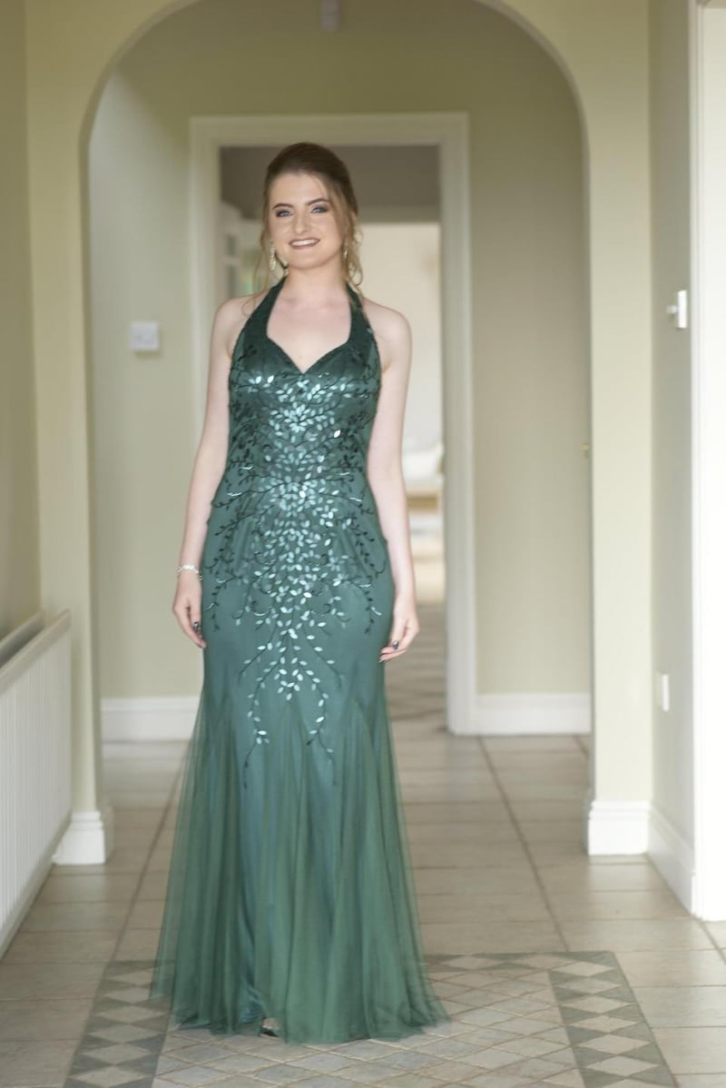 Heather Croghan in her deep green halter debs dress from Marian Gale