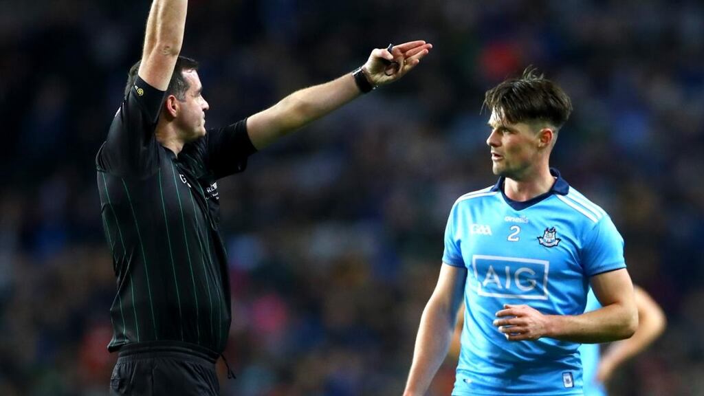 Referee Seán Hurson black-cards Eric Lowndes of Dublin in the Dublin v Kerry Division 1 clash at Croke Park last month. Photograph: James Crombie:Inpho