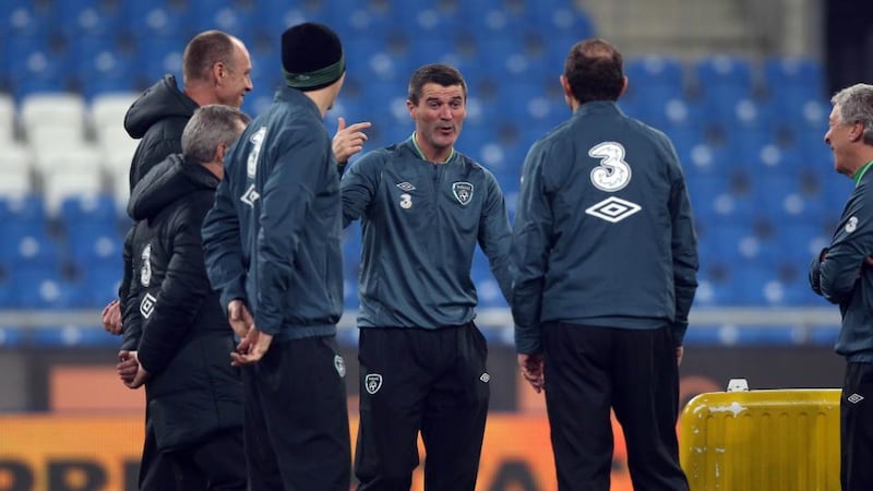 Republic of Ireland assistant manager Roy Keane shares a joke with Martin O’Neill and the coaching staff. Photograph: Donall Farmer/Inpho