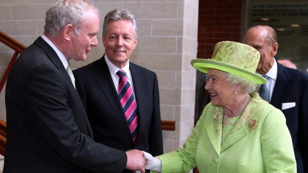 Martin McGuinness shakes hands with Queen Elizabeth in Belfast in 2012. Photograph: Paul Faith/PA