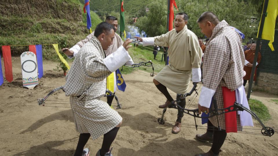 Bhutan’s national sport: archers celebrate after a team-mate hits a target during a tournament. Photograph: Kuni Takahashi/New York Times